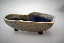 Tranquil Deep Blue Waves with White Foam